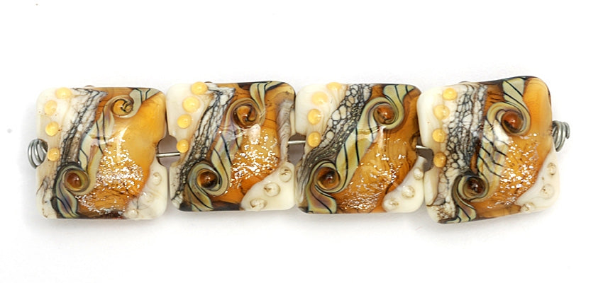 10801714 - Four Butterscotch Stardust Pillow Beads