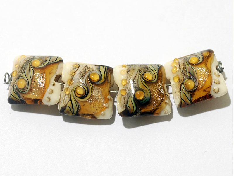10801714 - Four Butterscotch Stardust Pillow Beads