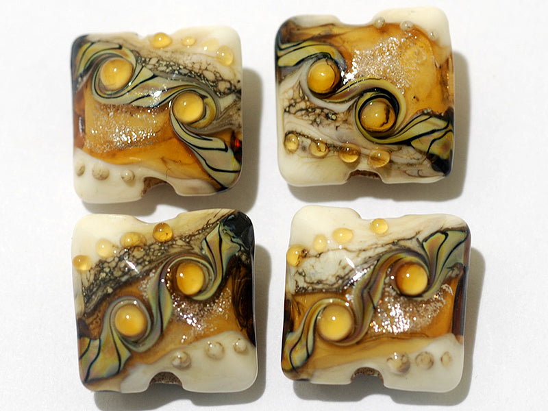 10801714 - Four Butterscotch Stardust Pillow Beads