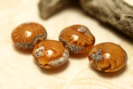 10801912 - Four Amber Wave Lentil Beads