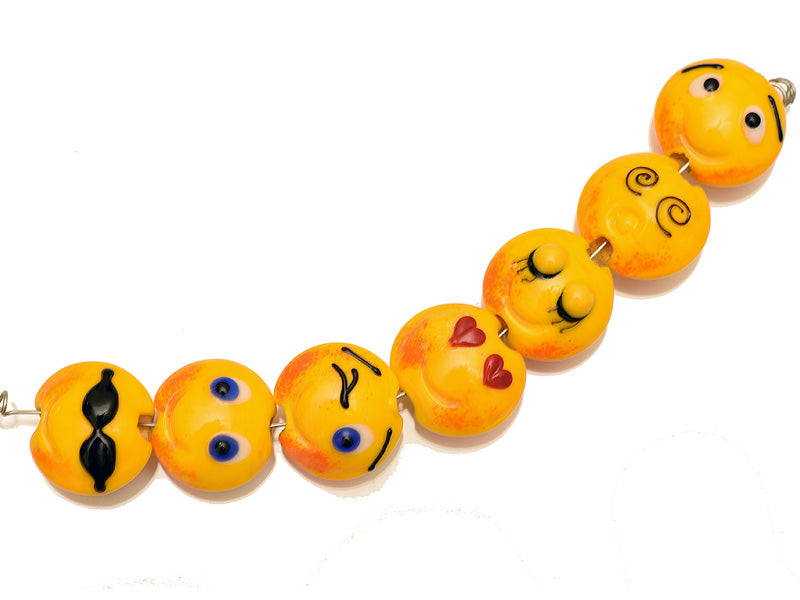 10802702 - Seven Emoji Lentil Beads