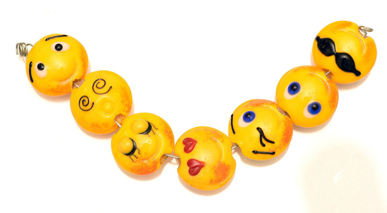 10802702 - Seven Emoji Lentil Beads