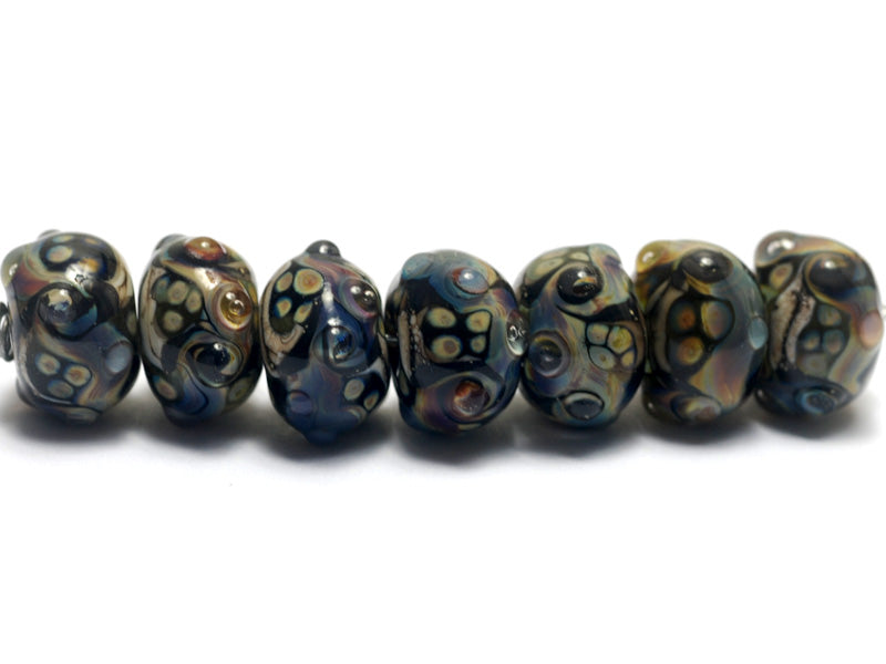 10902301 - Seven Cheyenne Rock Rondelle Beads