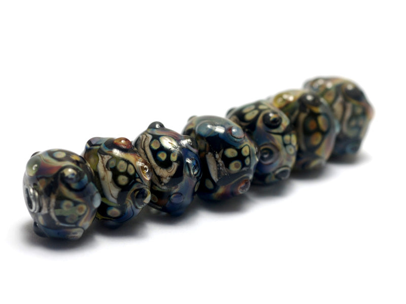 10902301 - Seven Cheyenne Rock Rondelle Beads