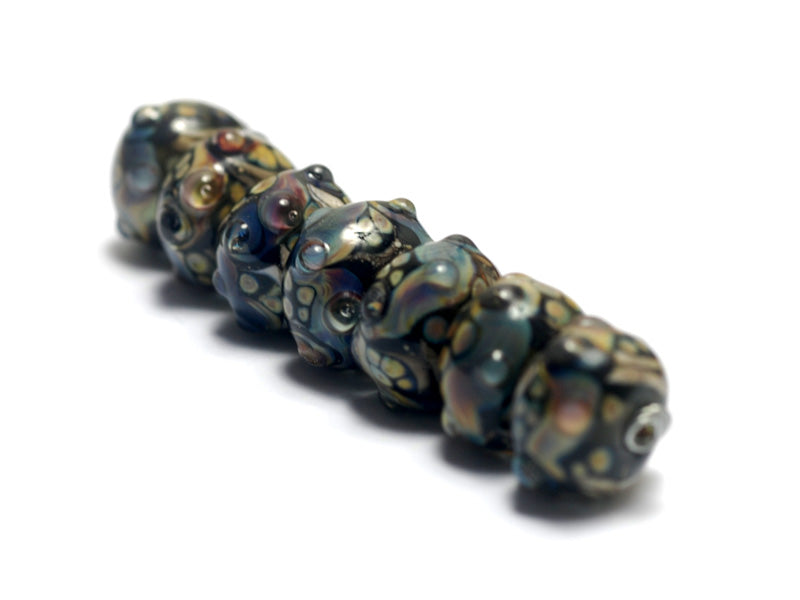 10902301 - Seven Cheyenne Rock Rondelle Beads