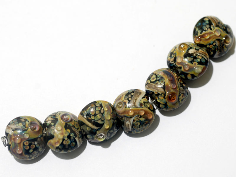 10902302 - Seven Cheyenne Rock Lentil Beads