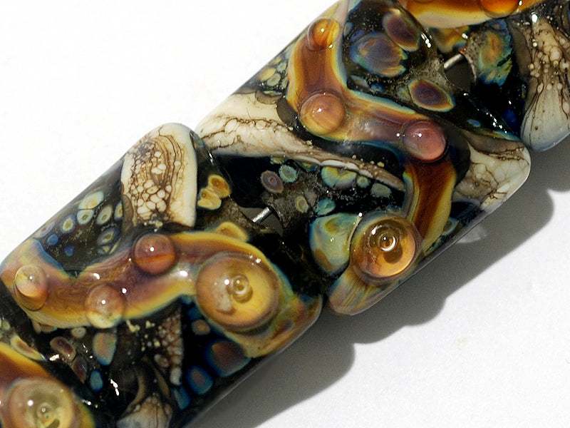 10902304 - Seven Cheyenne Rock Pillow Beads