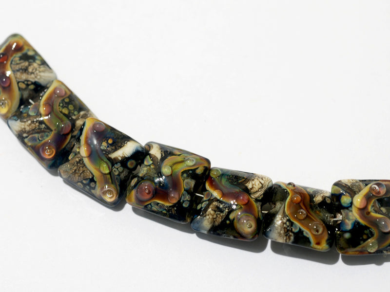 10902304 - Seven Cheyenne Rock Pillow Beads