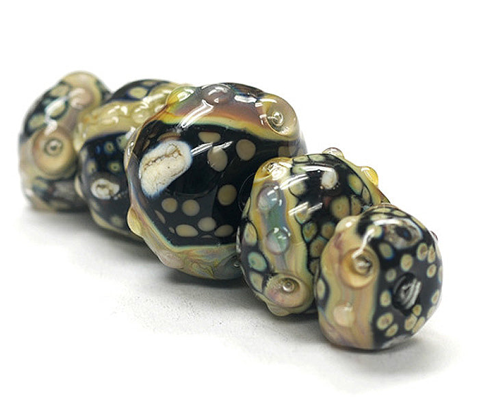 10902311 - Five Graduated Cheyenne Rock Beads