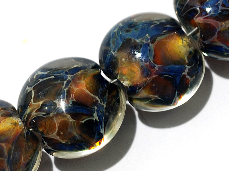 10902502 - Seven Multi-color w/Blue & Red Lentil Beads