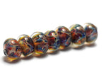 10902601 - Seven Multi-color w/Blue & Red Rondelle Beads
