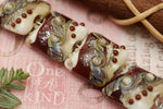 10902814 - Four Dark Cherry Stardust Pillow Beads