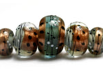 10903211 - Five Smokey Bronze Graduated Rondelle Beads