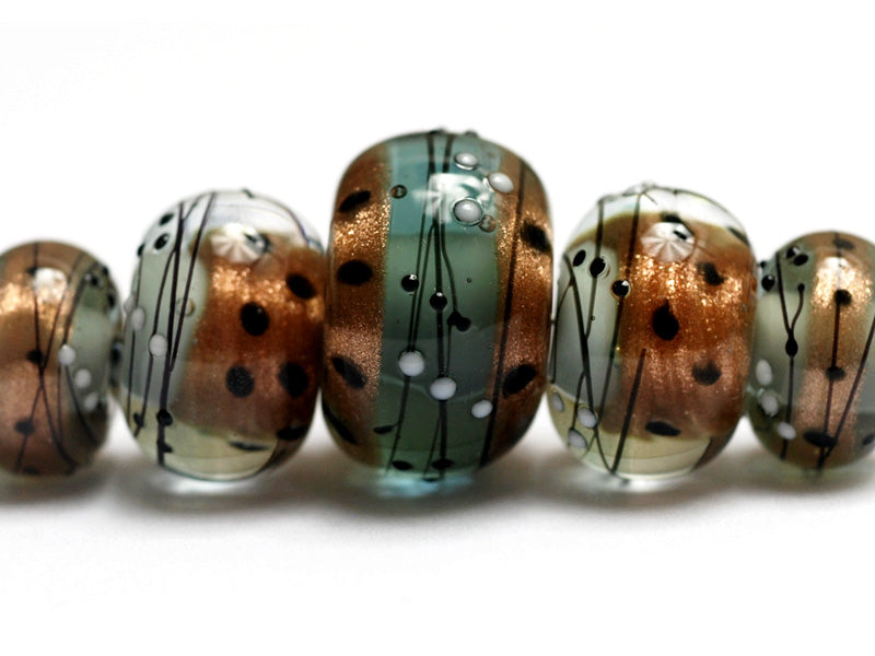 10903211 - Five Smokey Bronze Graduated Rondelle Beads