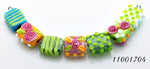 11001704 - Seven Pink/Orange/Green Tile Beads