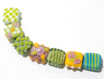11001704 - Seven Pink/Orange/Green Tile Beads