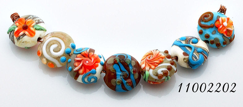 11002202 - Seven Turquoise w/Brown Lentil Beads