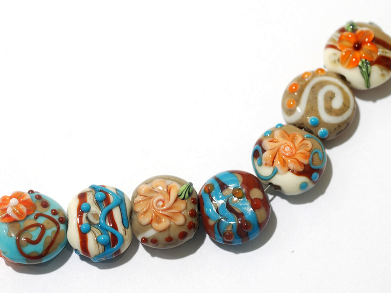 11002202 - Seven Turquoise w/Brown Lentil Beads