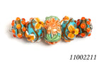 11002211 - Five Graduated Turquoise w/Brown Rondelle Beads