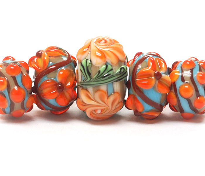 11002211 - Five Graduated Turquoise w/Brown Rondelle Beads