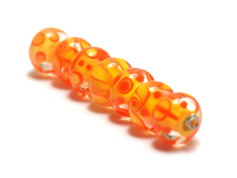 11003501 - Seven Orange & Yellow Rondelle Beads