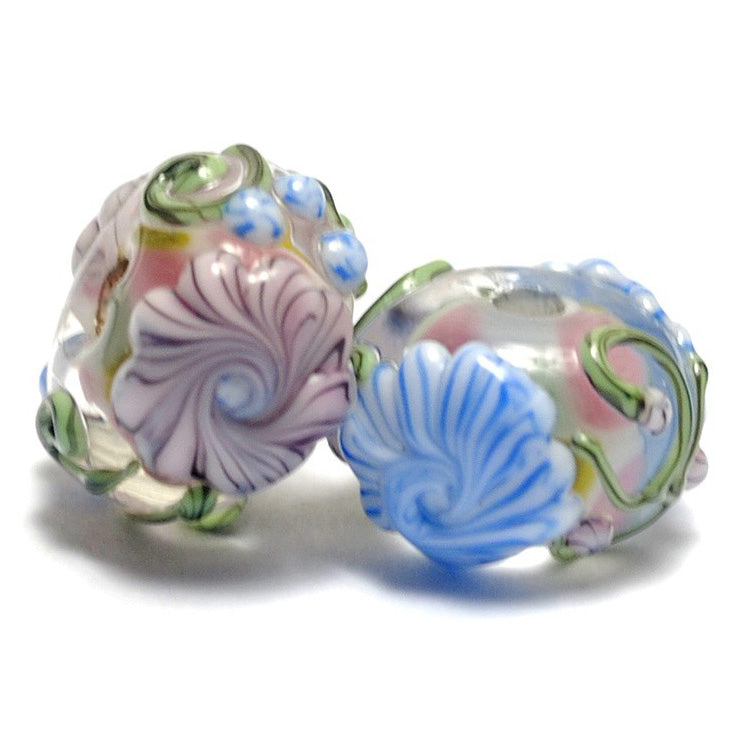 11005401 - Seven Light Pink w/Blue Floral Rondelle Beads