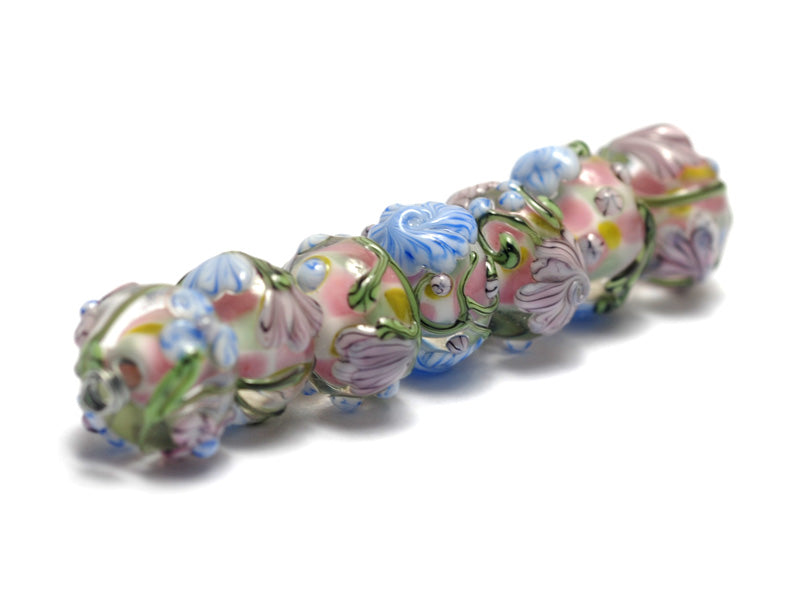 11005401 - Seven Light Pink w/Blue Floral Rondelle Beads