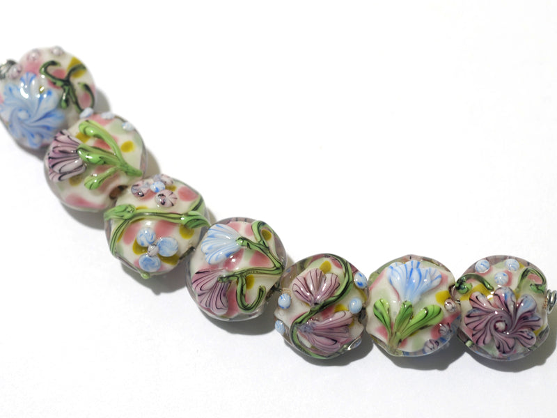 11005402 - Seven Light Pink w/Blue Floral Lentil Beads