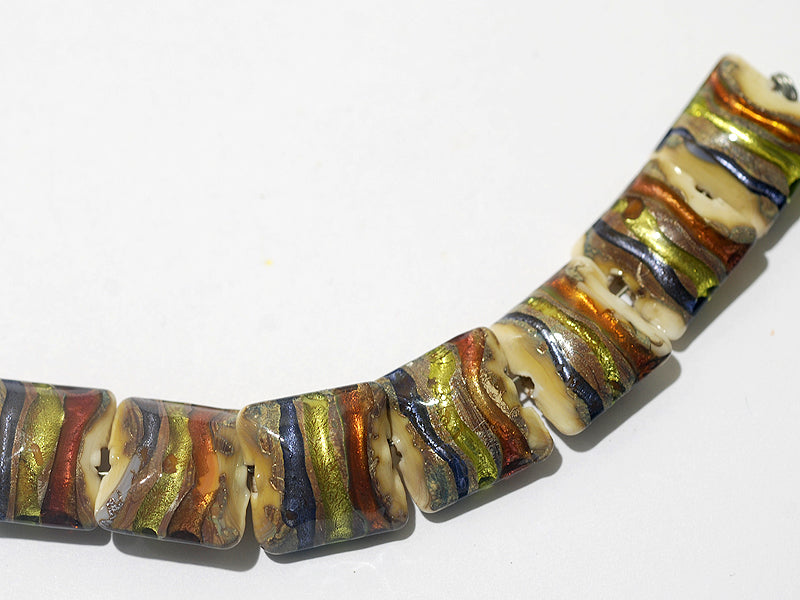 11005604 - Seven Multi-colored & Ivory Pillow Beads