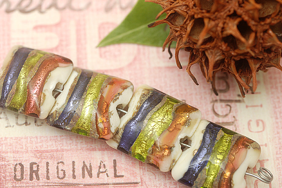 11005614 - Four Multi-colored & Ivory Pillow Beads