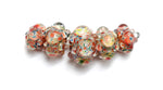 11005711 - Five Graduated OrangeRed & Green Rondelle Beads