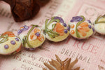 11005802 - Seven Purple w/Orange Flora Lentil Beads