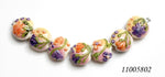 11005802 - Seven Purple w/Orange Flora Lentil Beads