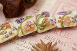 11005804 - Seven Purple w/Orange Flora Pillow Beads