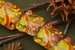 11007004 - Seven Carolina Parakeet Pillow Beads