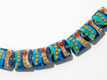 11007204 - Seven Gouldain Finch Pillow Beads