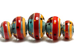 11007811 - Five Carmine Stripes Graduated Rondelle Beads
