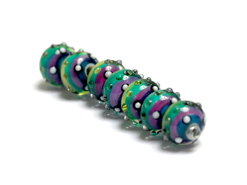 11008701 - Seven Begonia Stripes Rondelle Beads