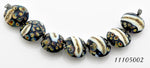 11105002 - Seven Black/Ivory & Beige Lentil Beads
