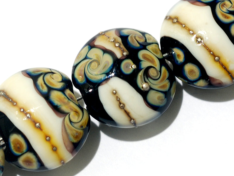 11105002 - Seven Black/Ivory & Beige Lentil Beads