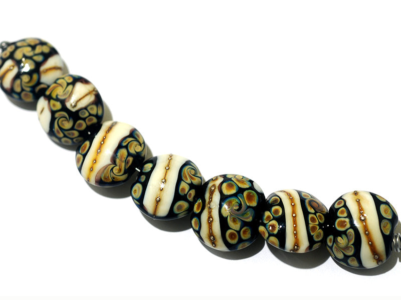11105002 - Seven Black/Ivory & Beige Lentil Beads