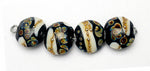11105012 - Four Black/Ivory & Beige Lentil Beads
