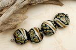 11105012 - Four Black/Ivory & Beige Lentil Beads