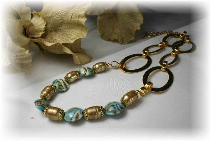 11105102 - Necklace using Turquoise/Ivory & Beige Lentil Beads