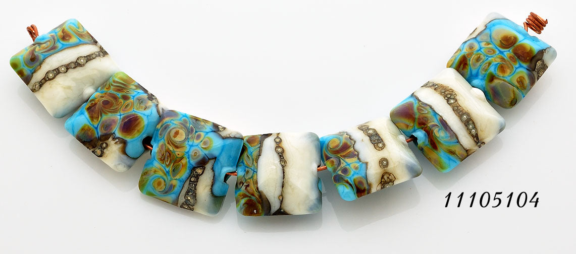 11105104 - Seven Turquoise/Ivory & Beige Pillow Beads