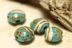 11105112 - Four Turquoise/Ivory & Beige Lentil Beads