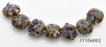 11106002 - Seven Purple w/Beige Lentil Beads
