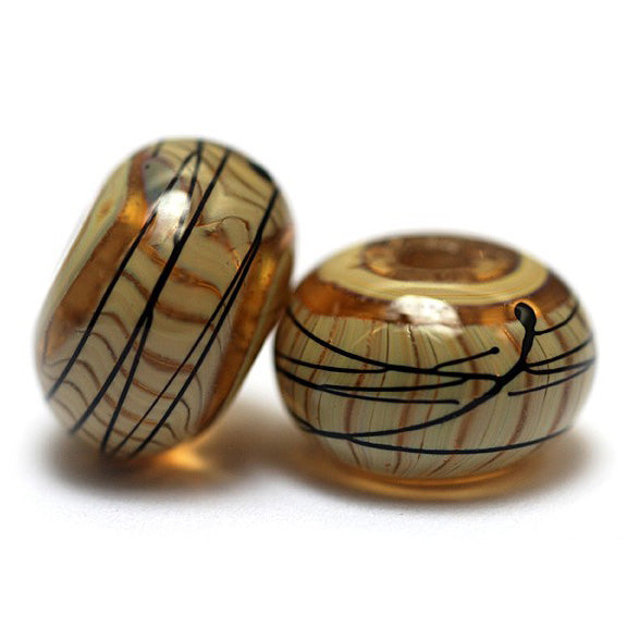 11106101 - Seven Transparent Brown w/Beige Strips Rondelle Beads