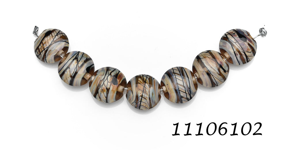 11106102 - Seven Transparent Brown w/Beige Strips Lentil Beads