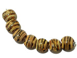 11106102 - Seven Transparent Brown w/Beige Strips Lentil Beads